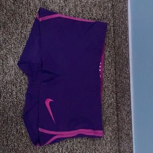 Purple and pink Nike spandex